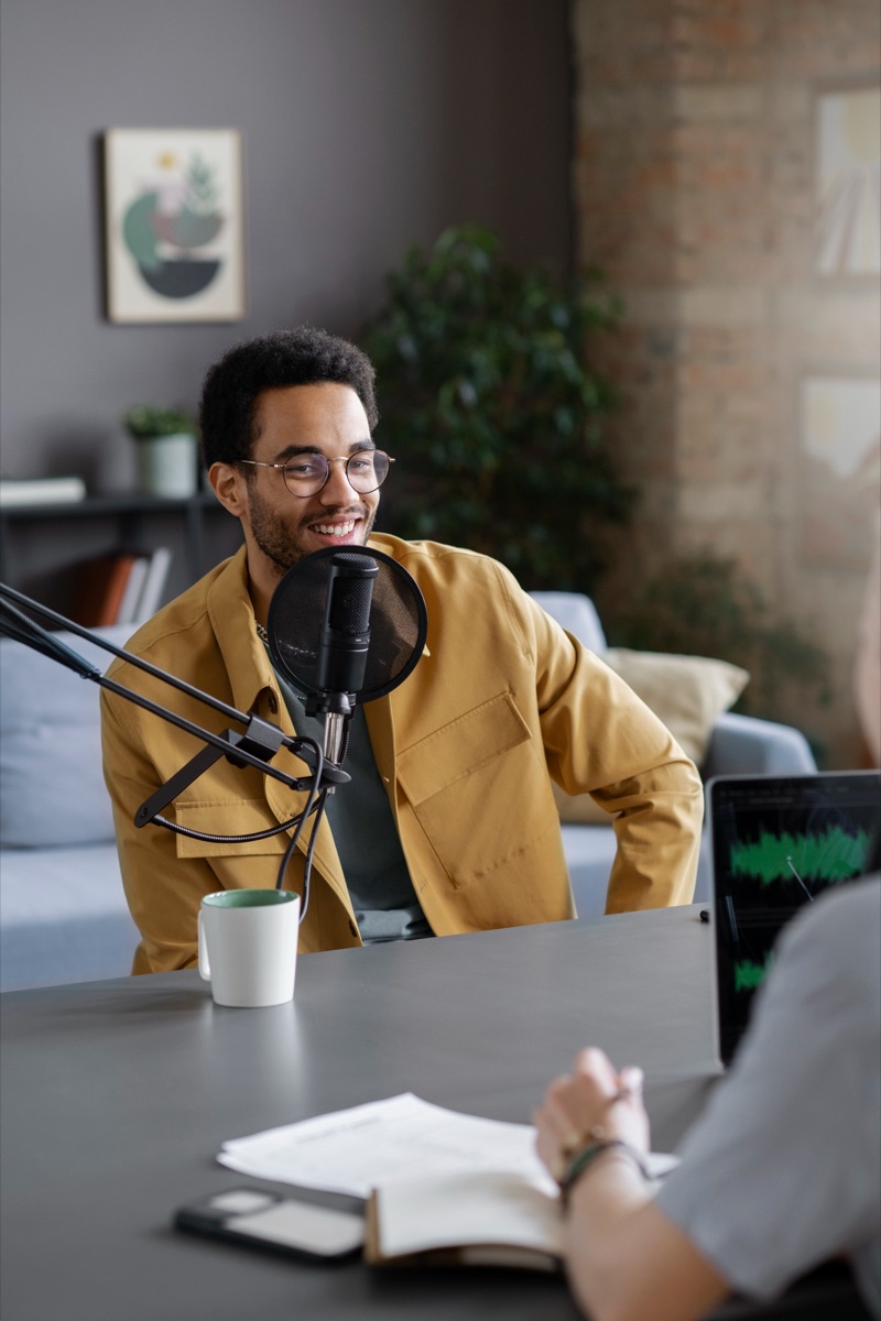 Entrepreneur sharing a story on the RoarCast podcast